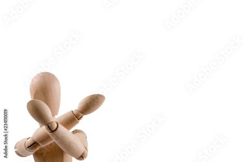 Wooden dummy holds two hands infront of face in asking pose isolated on white background. photo