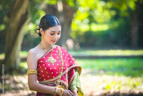 Asia woman in Thai dress traditional-Noppamas Queen Contest in Loy Kratong photo