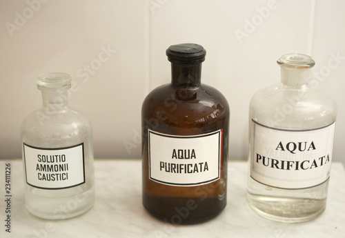 Ingredients for drugs in bottles. Old pharmacy.