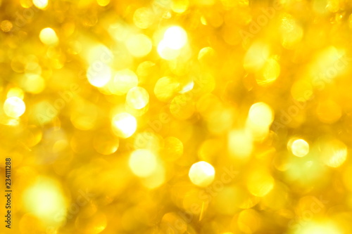 Color gold bokeh for background,For Christmas and Happy new year.