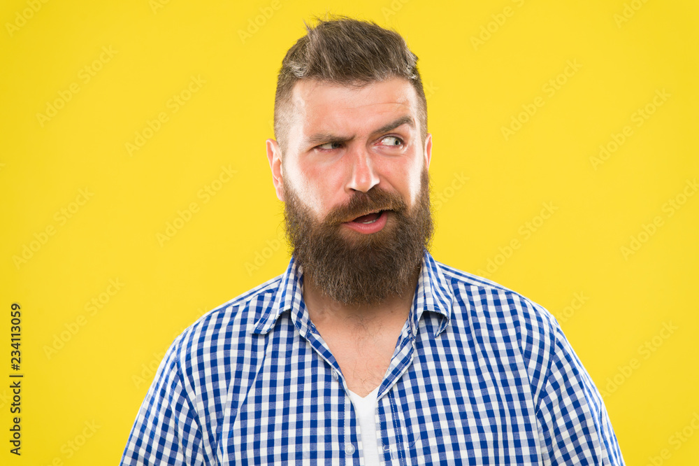 Sounds tricky. Man serious face raising eyebrow not confident. Have some doubts. Hipster bearded face not sure in something. Doubtful bearded man on yellow background close up. Doubtful expression Sounds tricky. Man serious face raising eyebrow not confident. Have some doubts. Hipster bearded face not sure in something. Doubtful bearded man on yellow background close up. Doubtful expression