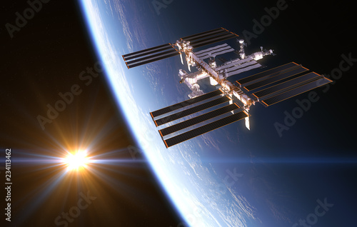 Fototapeta Naklejka Na Ścianę i Meble -  International Space Station On Background Of Rising Sun