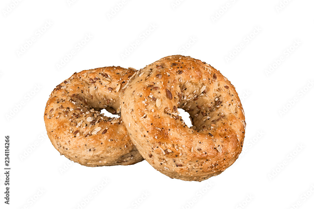 Close up on a set of multigrain bagel. Isolated on white background.