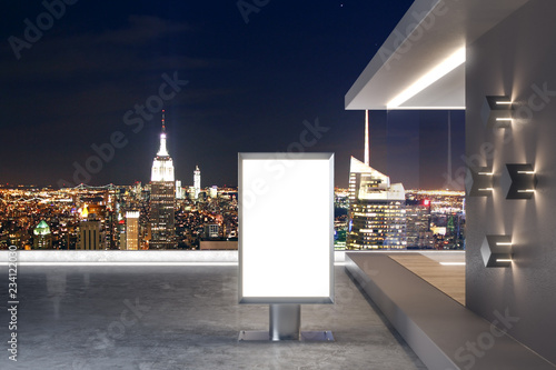 Empty white ad poster on rooftop