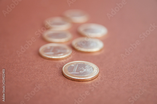 seven coins in one Euro top side view