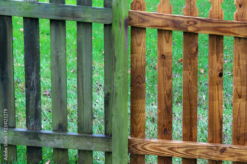 two parts of wooden fence before and after pressure wash