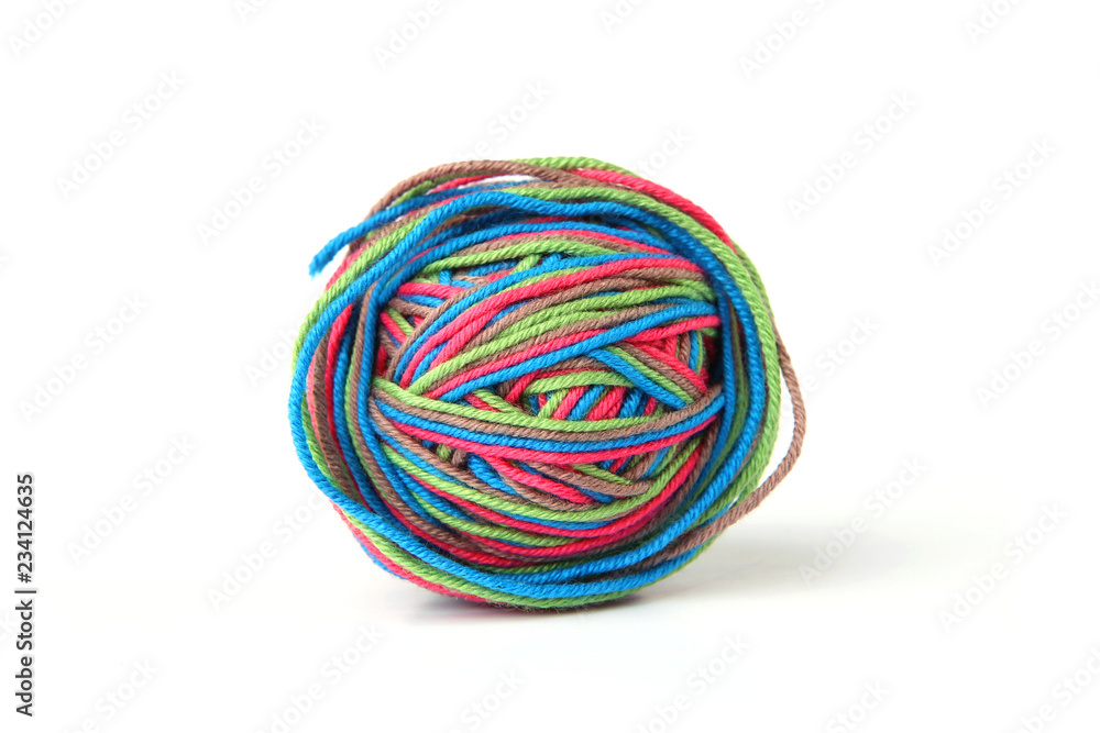 Colorful cotton thread ball from four color thread isolated on white background. Different color pink, green, grey, blue thread mix.