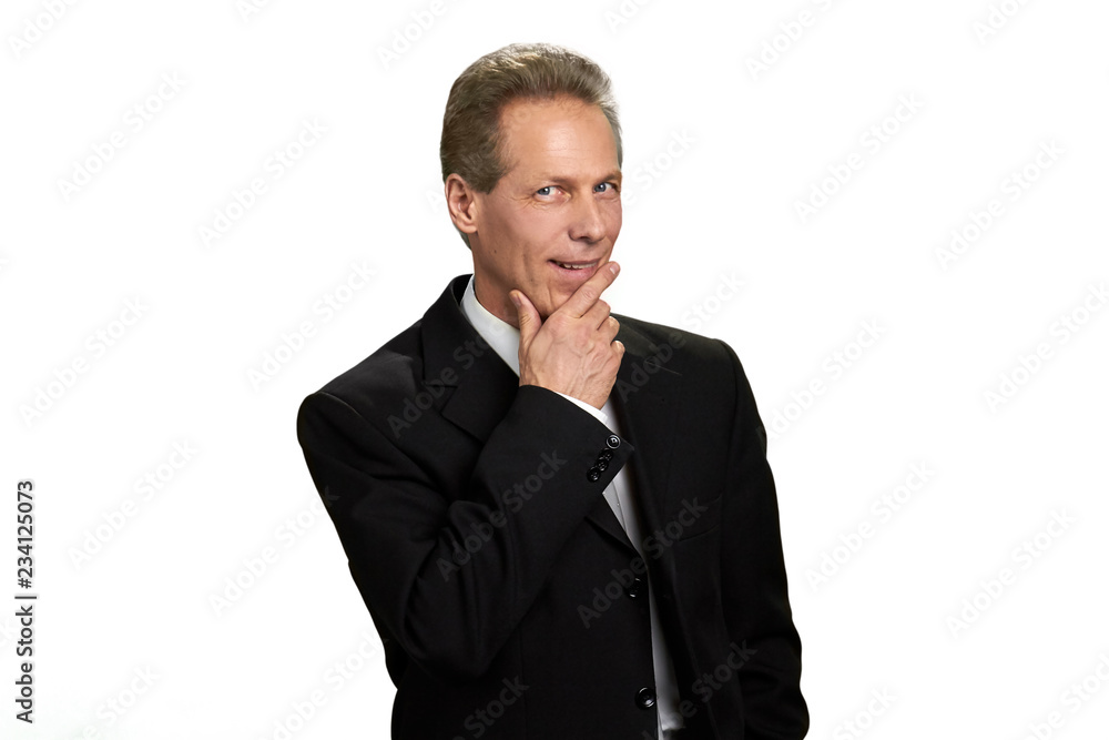 Portrait of thinking businessman on white background. Caucasian middle-aged man in formal wear looking flirtatiously. Flirty macho man on white background. Invitation for a date. Portrait of thinking businessman on white background. Caucasian middle-aged man in formal wear looking flirtatiously. Flirty macho man on white background. Invitation for a date.