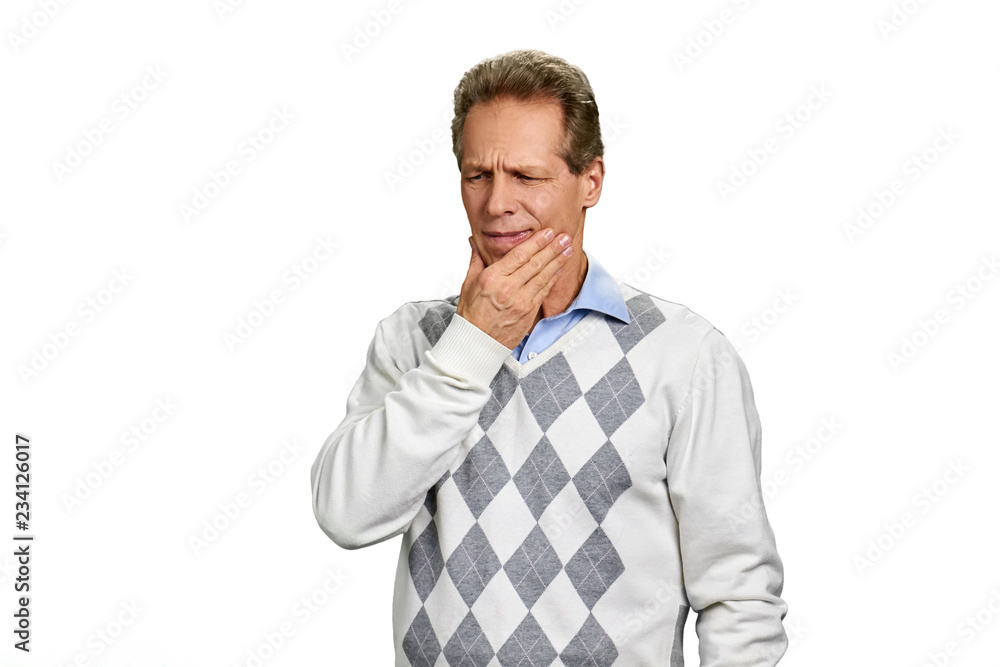 Portrait of man having tooth pain. Unhappy middle-aged man touching his cheek because of strong toothache over white background. Dentistry and health care. Portrait of man having tooth pain. Unhappy middle-aged man touching his cheek because of strong toothache over white background. Dentistry and health care.