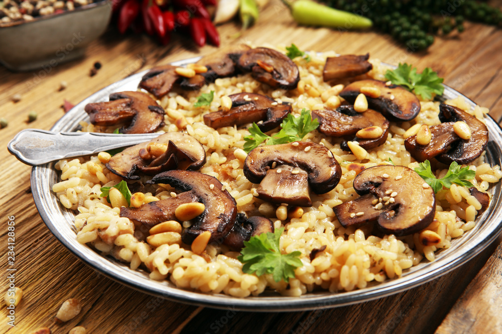 risotto with mushrooms, fresh herbs and parmesan cheese risotto with mushrooms, fresh herbs and parmesan cheese