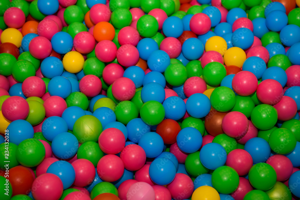 A lot of plastic colored balls. Toy children's different sphere. A lot of plastic colored balls. Toy children's different sphere.