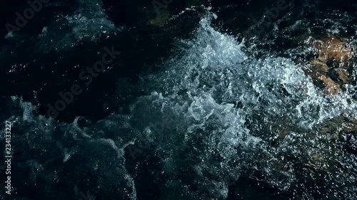 Wallpaper Mural Slow motion of waves on dark water surface with play of flecks of bright light close up. Amazing dramatic natural background. Shooting with 180fps. Epic mystical and magic night view. Crystal clear Torontodigital.ca