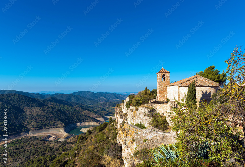 View of the Romanesque church of Santa Maria de Siurana, Tarragona, Catalunya, Spain. Copy space for text.