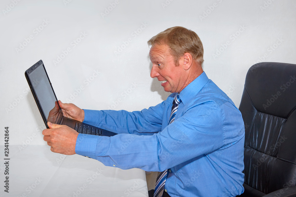 agrressiv businessman on the laptop agrressiv businessman on the laptop