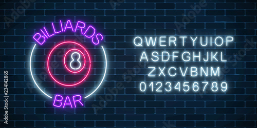 Neon billiards bar sign with alphabet on a brick wall background. Glowing billiard ball with 8 number.