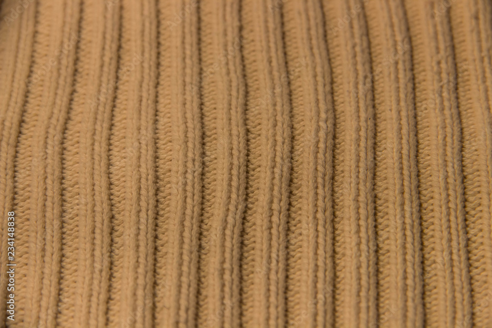 texture of knitted stripes of beige yarn texture of knitted stripes of beige yarn