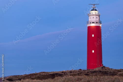 Eierland Lighthouse on the northernmost tip of the Dutch island of Texel after dusk