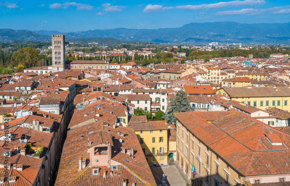 Panoramic view in Lucca with San Frediano Church. Tuscany, Italy.
