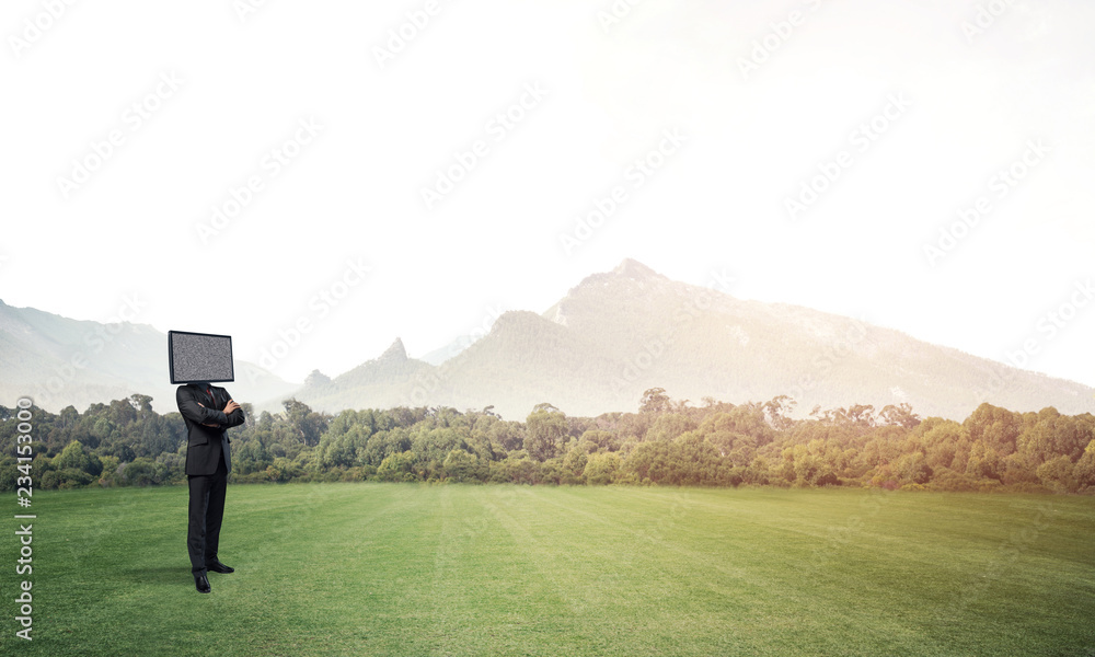 Businessman with TV instead of head.