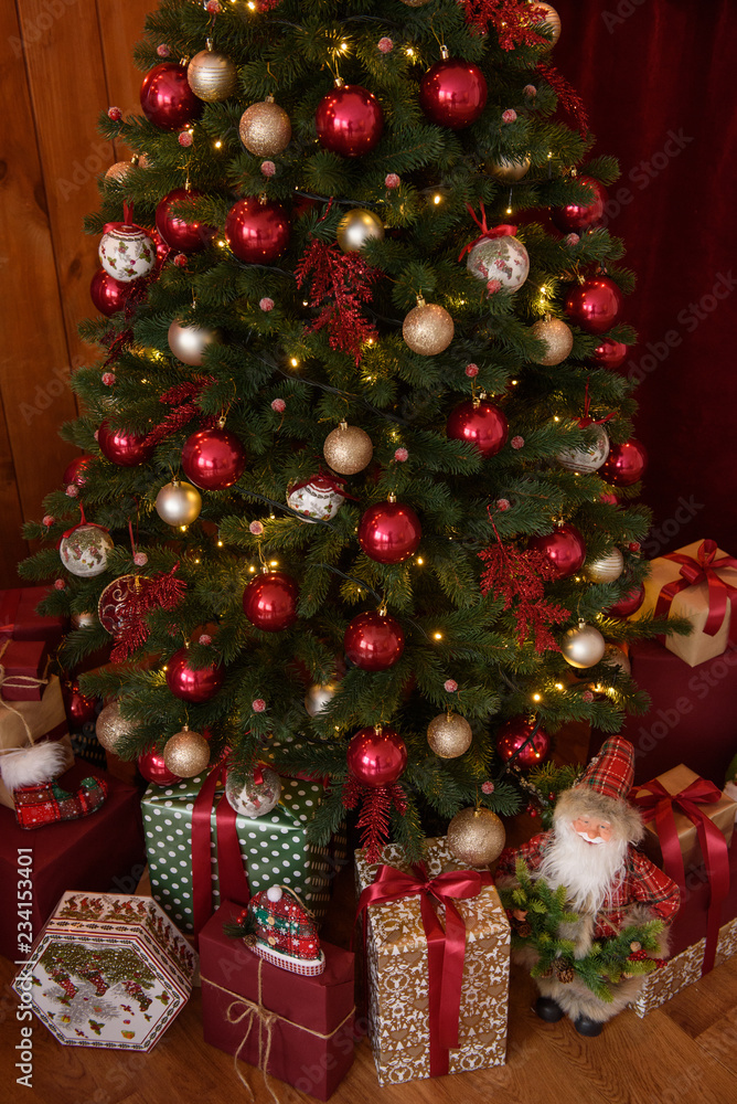 Christmas interior with gift boxes and Christmas fires. It can be used as a background Christmas interior with gift boxes and Christmas fires. It can be used as a background