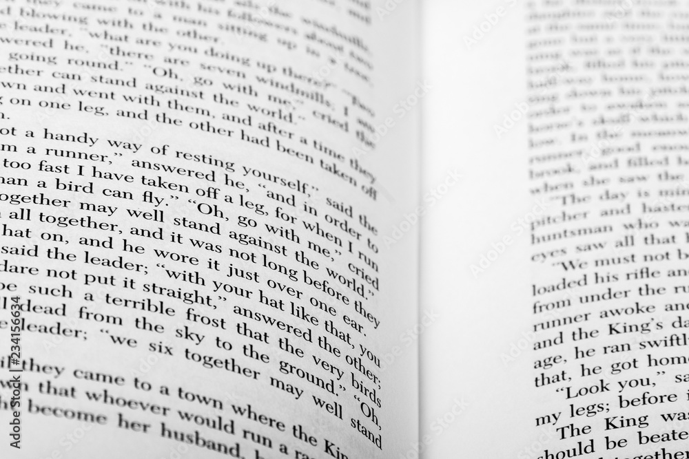 English words shown on two open book pages with selective depth of field. English words shown on two open book pages with selective depth of field.