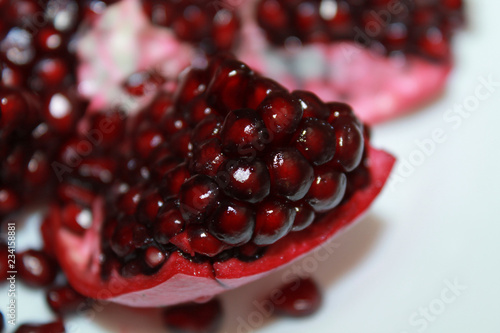 Wallpaper Mural ripe pomegranate on a white background Torontodigital.ca