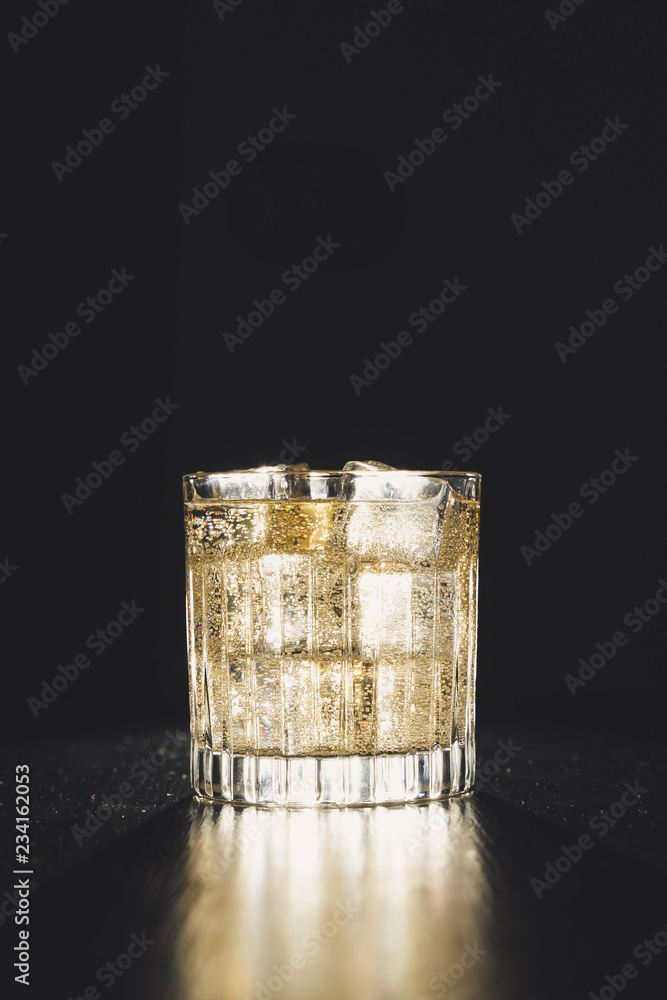 dark background whiskey ice glass ice hand photo moody pouring alcohol bourbon bartender bar hotel home