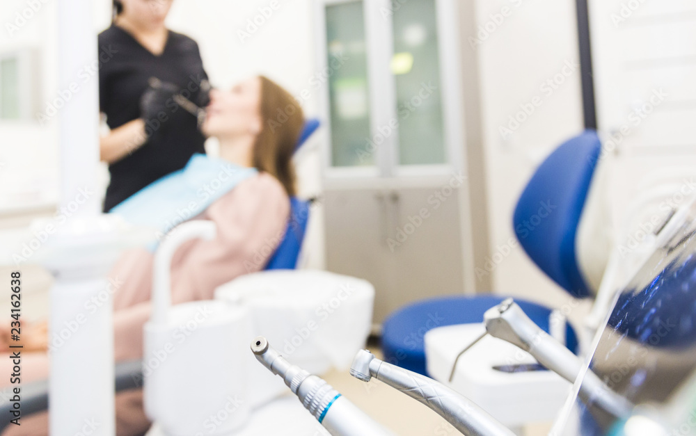 Obraz premium Dental clinic. Reception, examination of the patient. Teeth care. Modern dental equipment.