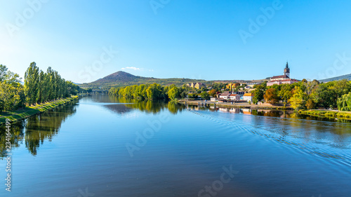 Radobyl Mountain in Ceske Stredohori, Central Bohemian Uplands. View from Labe River in Litomerice, Czech Republic. © pyty