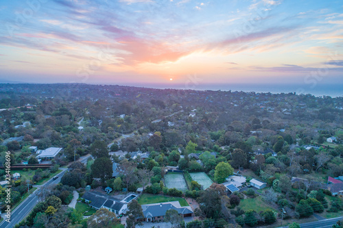 Rural area near the ocean at sunset - aerial view