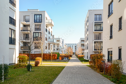 Obraz na płótnie Cityscape with residential buildings in late autumn
