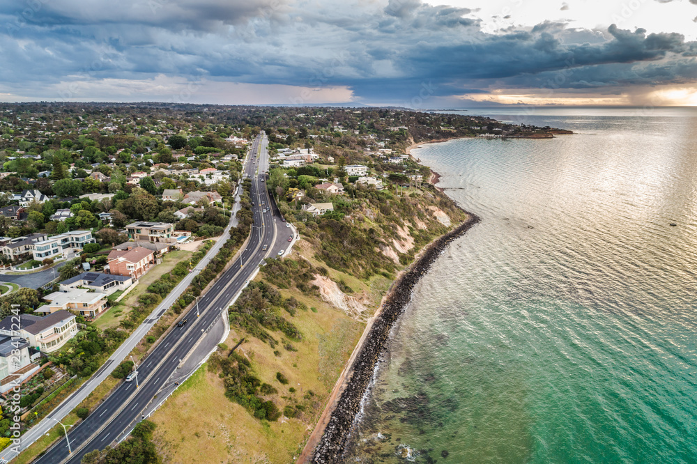 Aerial view of Nepean Highway passing through Oliver's Hill at sunset. Mornington Peninsula, Australia.