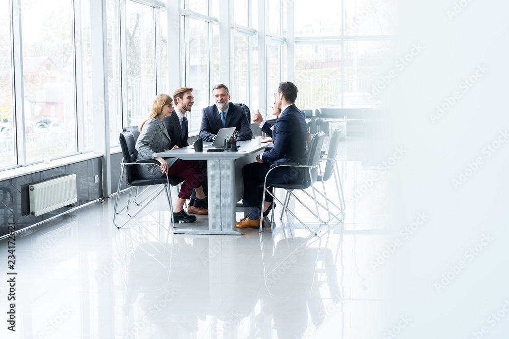Businesspeople discussing together in conference room during meeting at office. - obrazy, fototapety, plakaty 