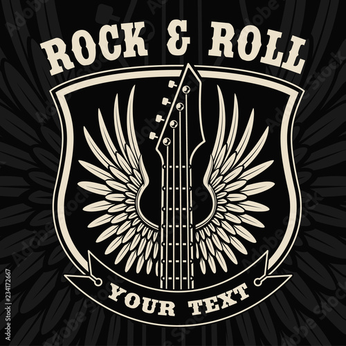 Vintage badge of guitar with wings on the dark background.