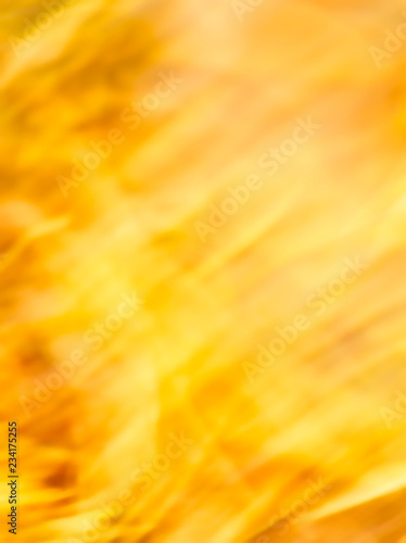 Golden blurred background. Yellow abstract background.
