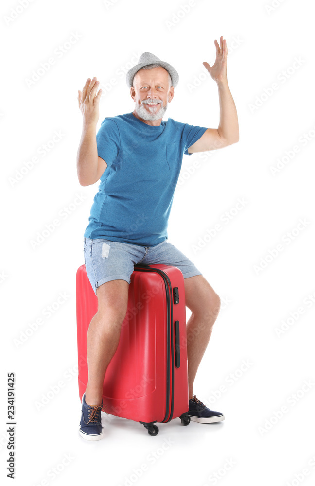 Senior man with suitcase on white background. Vacation travel Senior man with suitcase on white background. Vacation travel