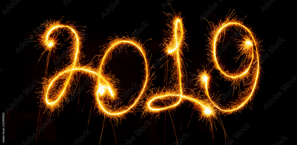 2019 with sparklers on black background 2019 with sparklers on black background