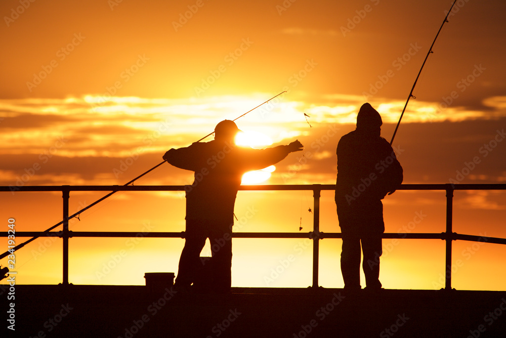 Fishing men at the beach