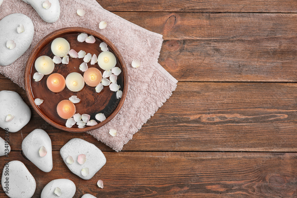 Flat lay composition with spa stones and space for text on wooden background Flat lay composition with spa stones and space for text on wooden background