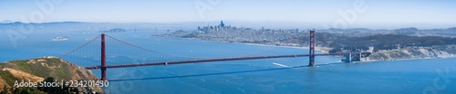 Photography Panoramic view of Golden Gate Bridge; the San Francisco skyline visible in the b