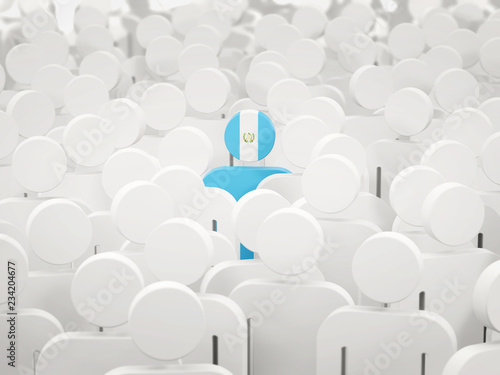 Man with flag of guatemala in a crowd