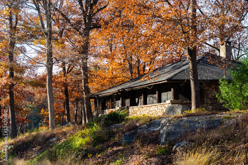 Stone building in woods in Harriman State Park, NY during Fall season.