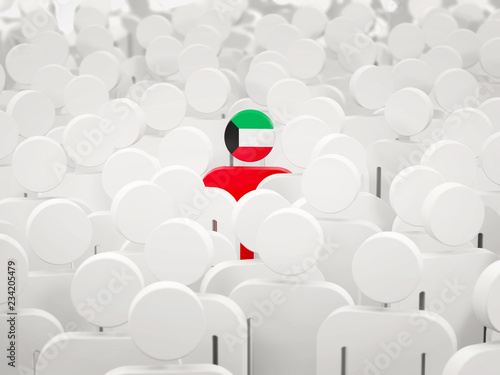 Man with flag of kuwait in a crowd