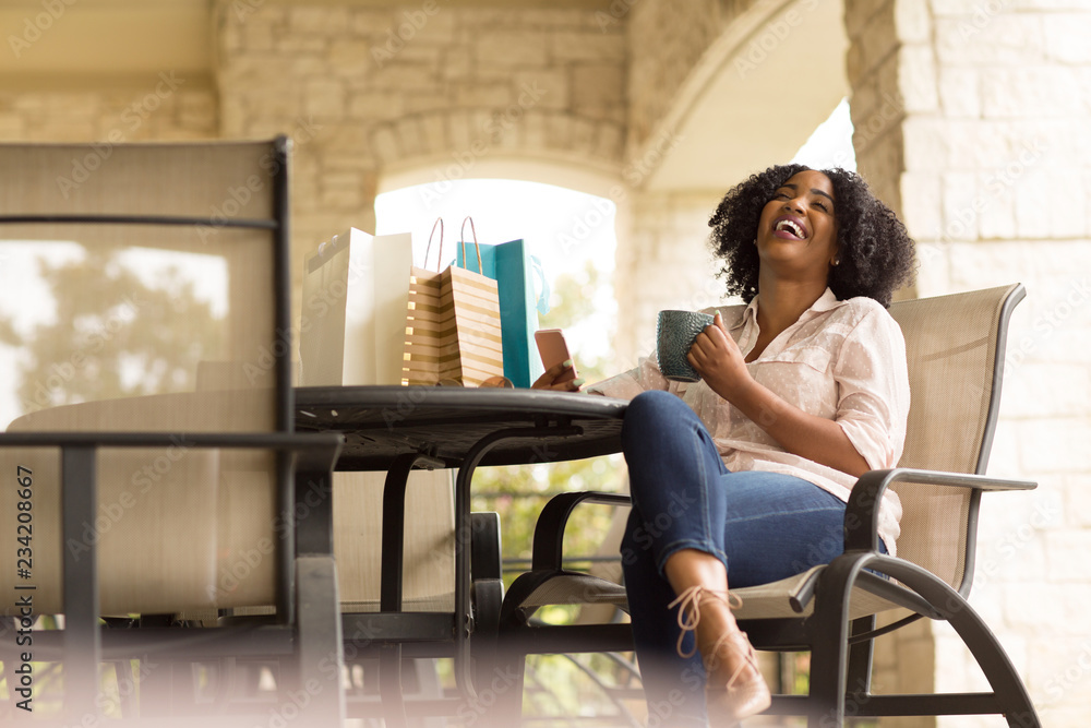 Portrait of an African American woman drinking coffee. Portrait of an African American woman drinking coffee.