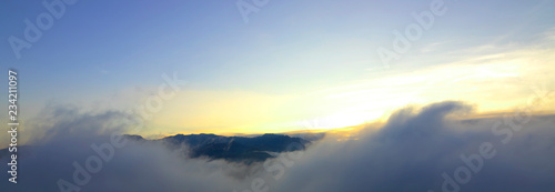 Sea of mist and sunrise at kongmu temple view point , mae hong son, Thailand