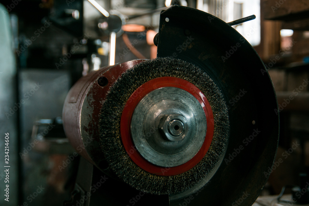 Workspace of blacksmith. Grinding tool in forge Workspace of blacksmith. Grinding tool in forge