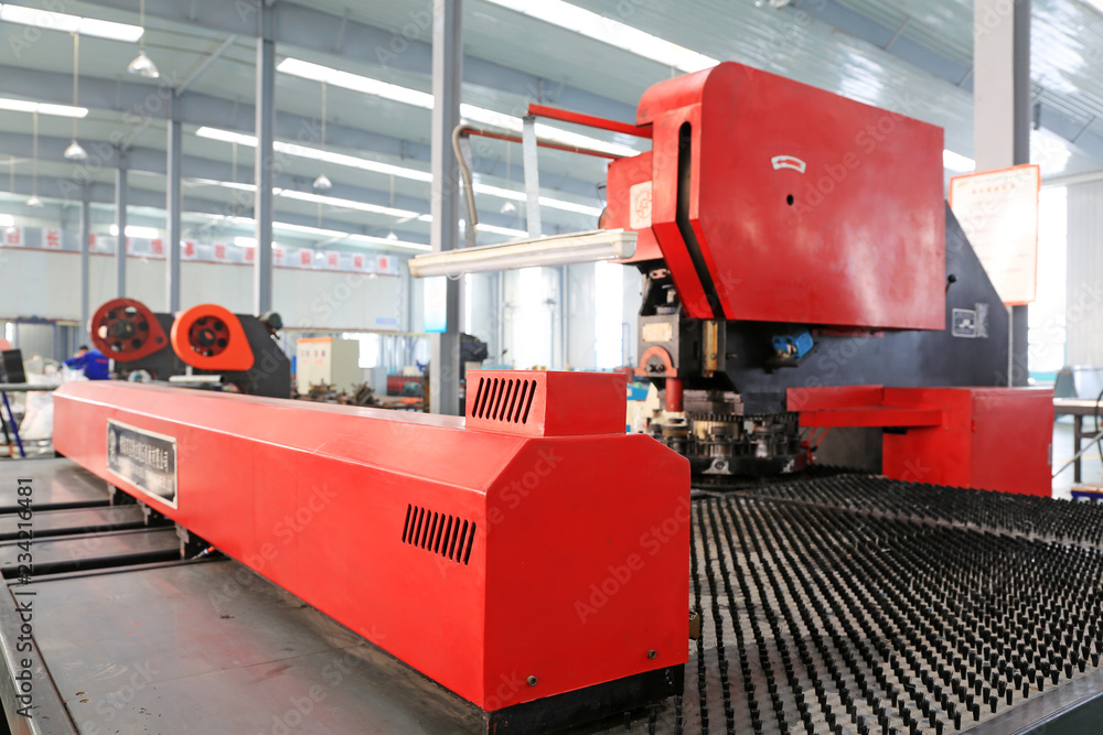 numerically-controlled machine tool in the production line, in a solar equipment production workshop on december 22, 2013, tangshan, china. numerically-controlled machine tool in the production line, in a solar equipment production workshop on december 22, 2013, tangshan, china.