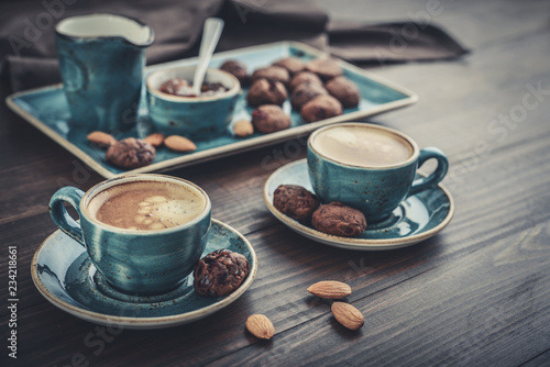 Two cup of coffee and with chocolate cookies