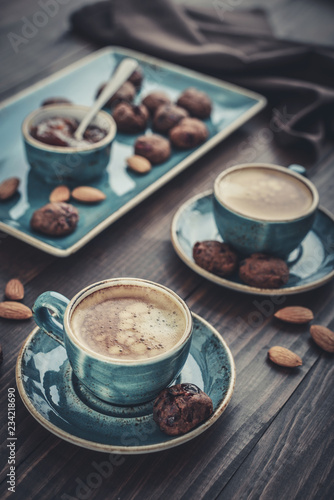 Two cup of coffee and with chocolate cookies