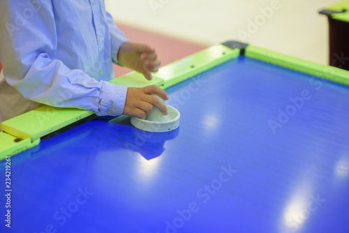 Wallpaper Mural boy playing air hockey Torontodigital.ca